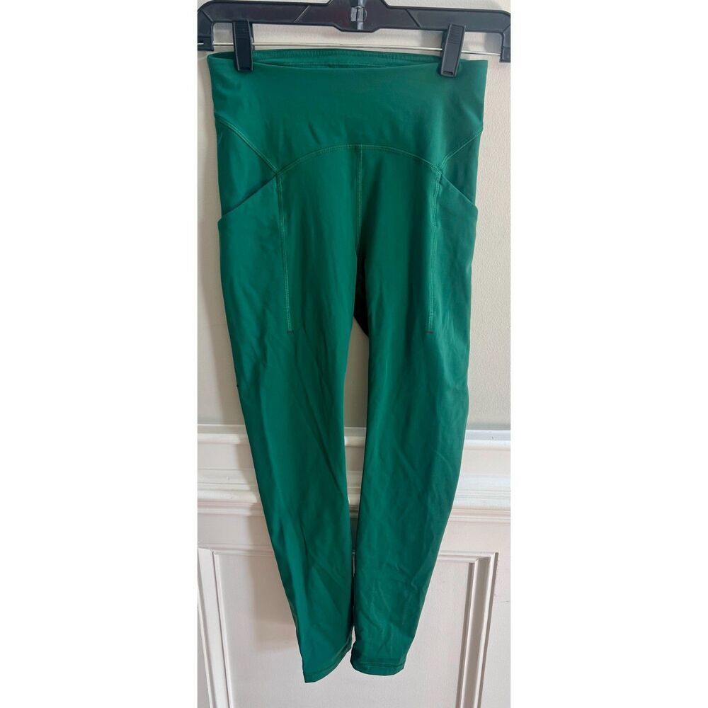 Lululemon Power Thru High Rise Green Leggings size 4 with pockets